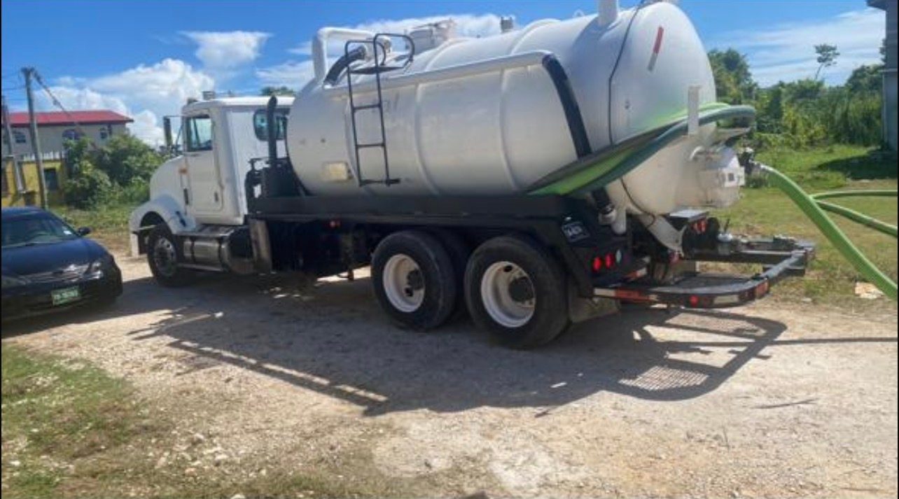 Sutherland Septic truck pumping a residential septic system in Belize