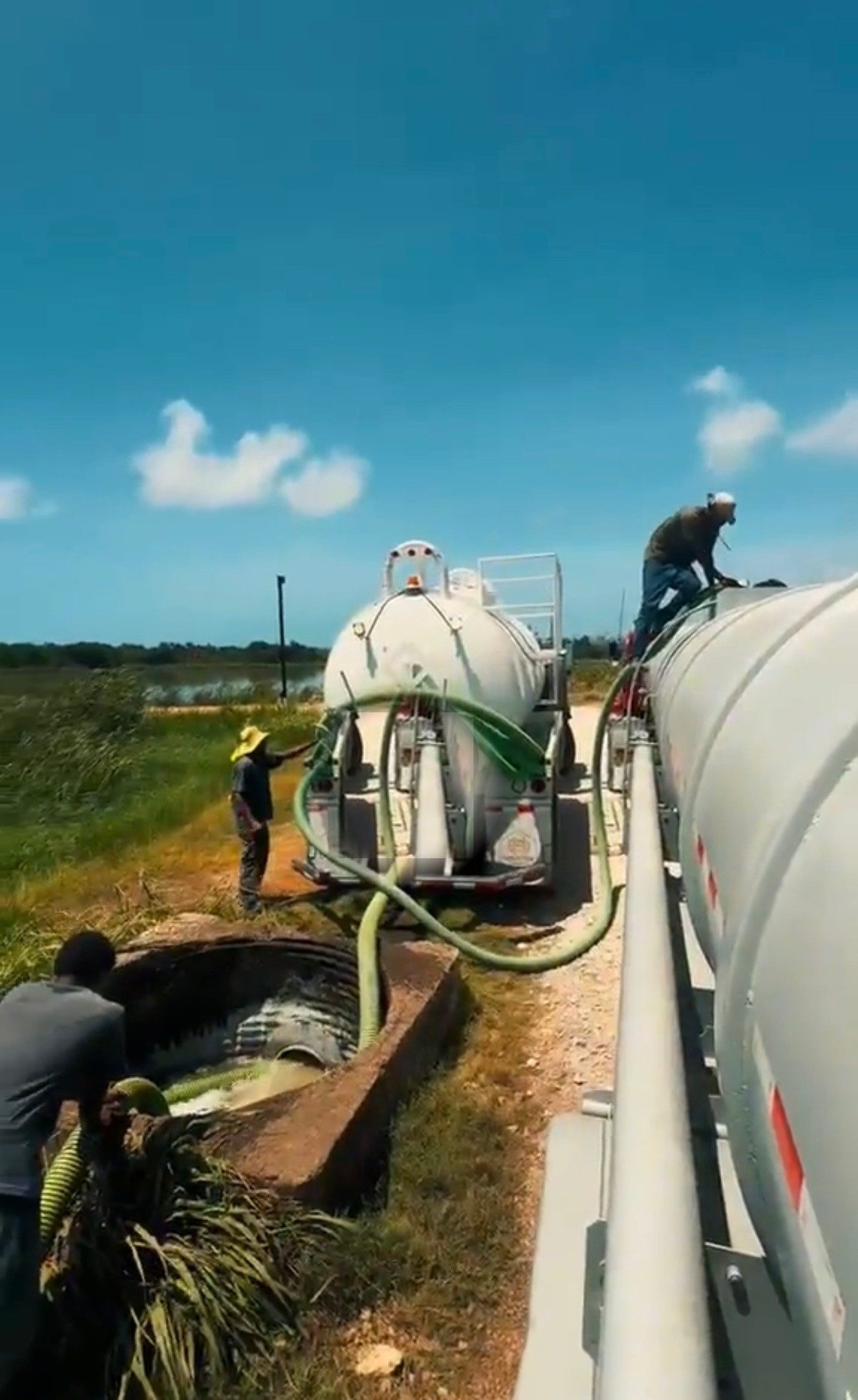 Two Sutherland Septic tankers transferring on site